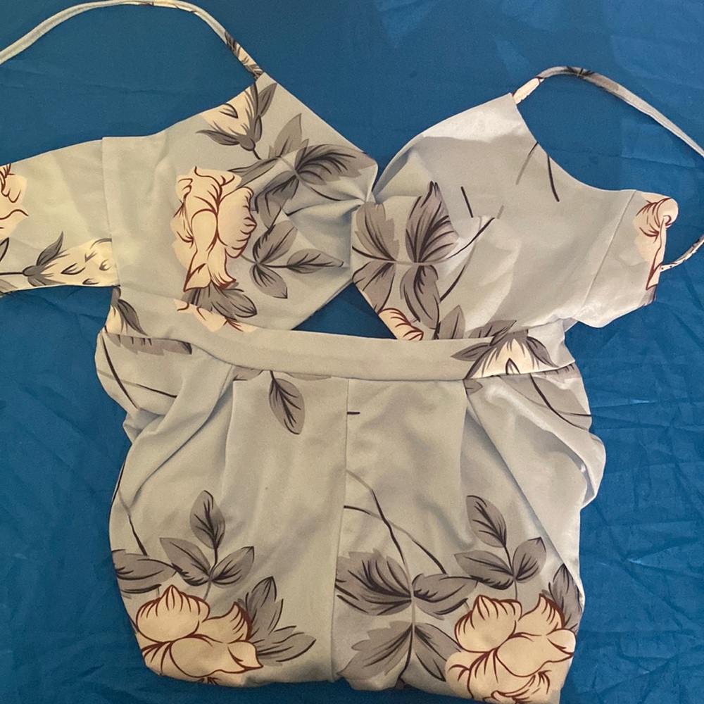 Baby blue floral body suit with cut outs